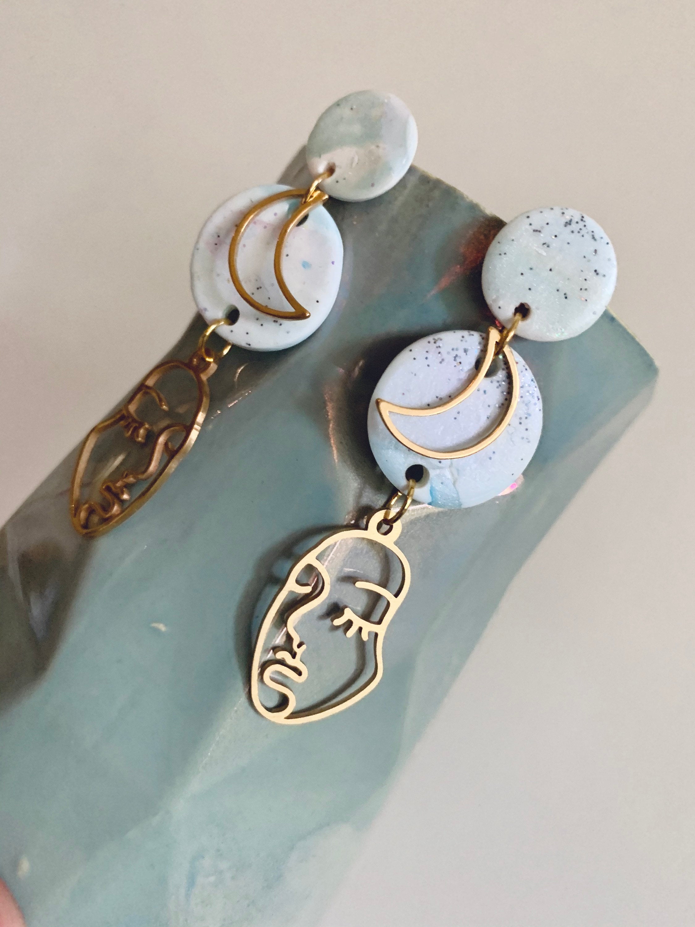 Face discount silhouette earrings