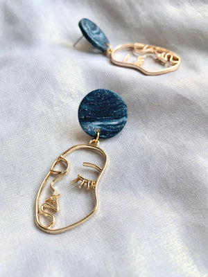 Open image in slideshow, Demeter Blue and Gold Face Silhouette Earrings
